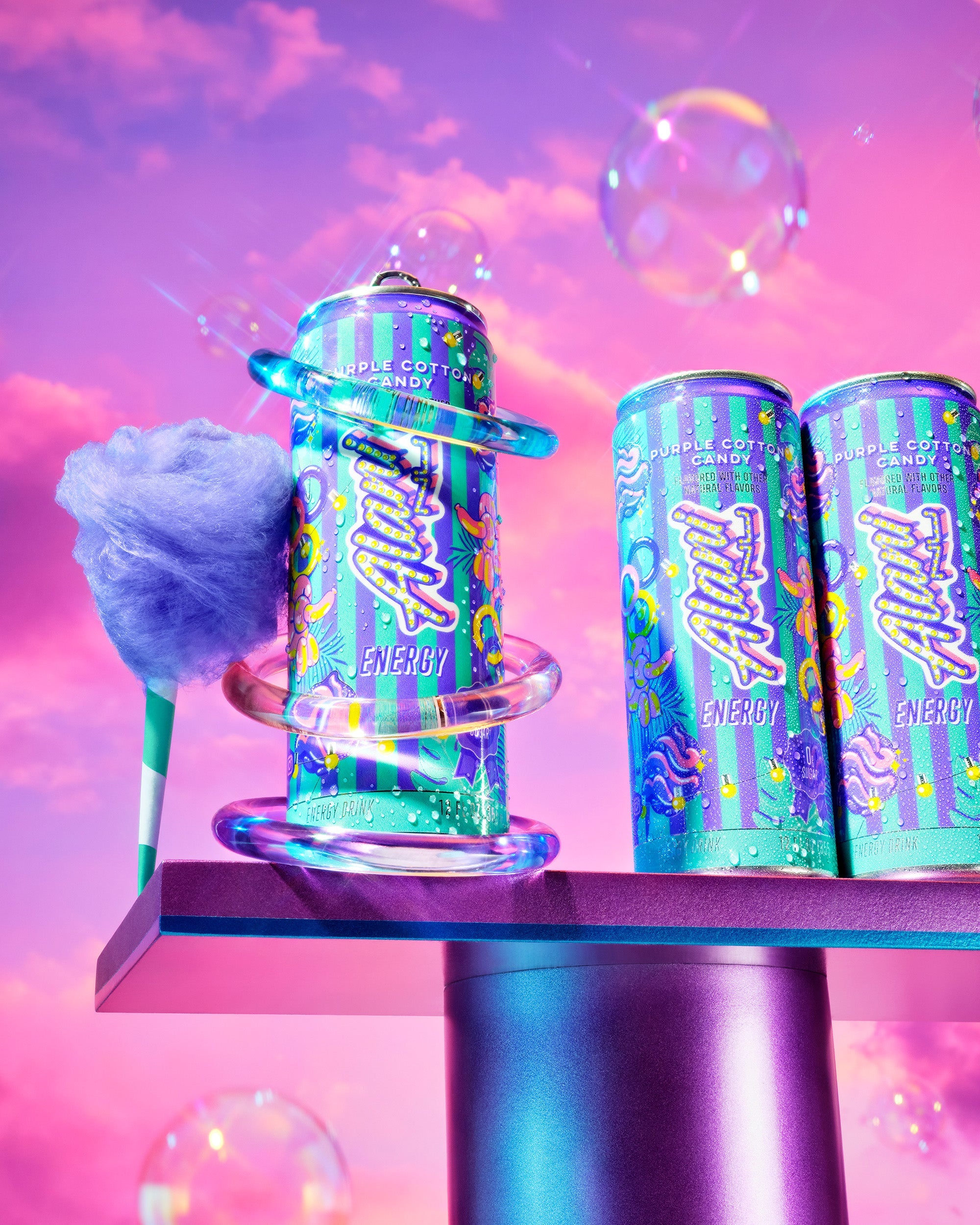 Purple Cotton Candy Alani cans with cotton candy campaign props
